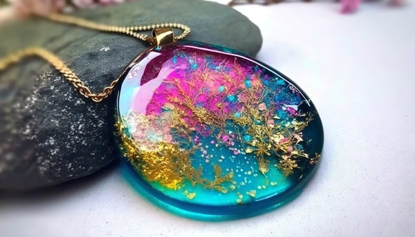 An epoxy resin pendant made using premium resin dyes.