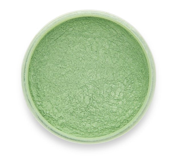 A container of Pistachio Green Pigment by Pigmently, seen from above with the lid removed to showcase the pastel green contents.