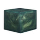 A resin cube made with the Pine Green Mica Powder Pigment by Pigmently.