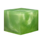 A resin cube made with the Pistachio Green Mica Powder Pigment by Pigmently.