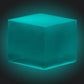 A resin cube made with the Blue Green Glow in the Dark Mica Powder Pigment by Pigmently, seen in a dark environment to showcase the glow effect.